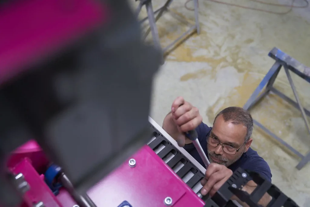 Man installing handling technology.