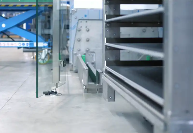 Stainless-steel lift fork for handling a stainless-steel frame.